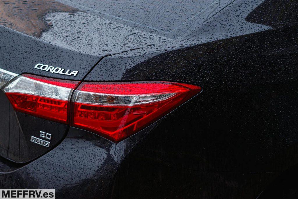 Raindrops on Black Toyota Corolla